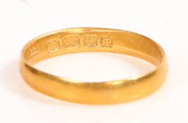 A 22 carat gold wedding band, weight 3.4 grams