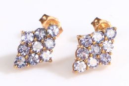 A pair of 10ct rose gold cluster earrings set with zircon. Measurements: 8.80 x 12.60mm. Stamped