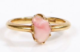 A 12 carat gold ring, the head set with rose quartz, weight 3.4 grams