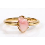 A 12 carat gold ring, the head set with rose quartz, weight 3.4 grams