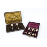 Two part sets of silver apostle spoons, consisting of two with matching sugar tongs and another part