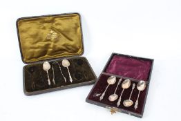 Two part sets of silver apostle spoons, consisting of two with matching sugar tongs and another part