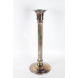 A very large and impressive silver plated candlestick, with a flared neck above a reeded stem,