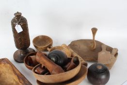 Collection of treen, to include butter pats, bowls, chopping board, table lamp base, two bowling