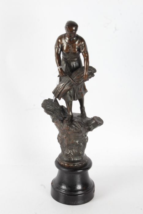 20th century French bronzed spelter figure, in the form of a lady harvesting wheat, 48cm tall