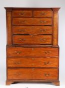 Unusual George III mahogany chest on chest, the concave cornice above two short and three long