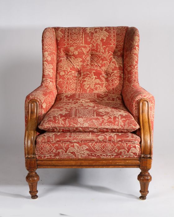 19th Century oak armchair, of large proportions, the button back with wing sides above a cushion