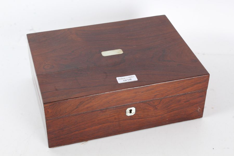 Victorian rosewood writing box, with mother of pearl inlay,the hinged lid enclosing a green
