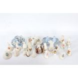 Collection of porcelain candle snuffers, to include crested examples, Royal Worcester 'English