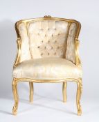 Continental gilt wood armchair, the button back with sweeping arms above a serpentine seat and