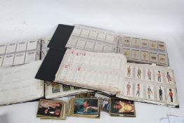 Cigarette cards, pre war, to include sets, part sets and odds, housed in four albums and one