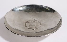 Keswick School of Industrial Arts white metal dish, the central rose head surrounded by beaten