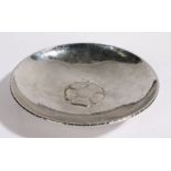 Keswick School of Industrial Arts white metal dish, the central rose head surrounded by beaten