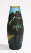 Emile Galle vase, the blue ground cased in black, yellow and blue with depiction of a mountainous
