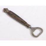 Georg Jensen Danish silver handled bottle opener, with scroll cast handle terminal, 16cm long