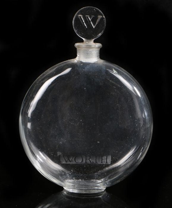 Rene Lalique Worth clear glass perfume bottle, the branded bottle with stopper moulded with the