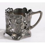 WMF Art Nouveau tea glass holder, the pierced shaped handle flanking the pierced body with depiction