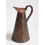 Joseph Sankey & Sons copper jug, with reptile skin effect exterior to the tapering body, 22.5cm