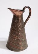 Joseph Sankey & Sons copper jug, with reptile skin effect exterior to the tapering body, 22.5cm