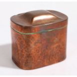 Keswick School of Industrial Arts copper tea caddy, the rectangular embossed lid above a beaten