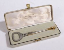 W & S Sorensen Danish silver bottle opener, the gadrooned tapering handle with gilt pierced crown