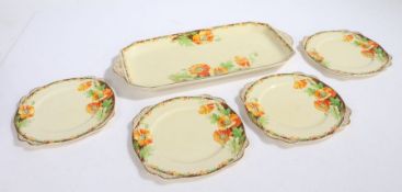 Clarice Cliff A.J.Wilkinson Ltd. Honeyglaze Bizarre sandwich set, consisting of tray and four side