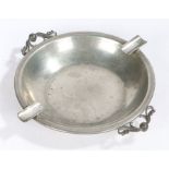 Max Rieg (1899-1985) pewter cigar ashtray, the circular dished bowl with pierced scroll and orb