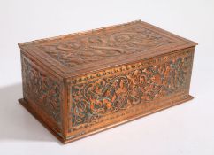 Keswick School of Industrial Arts copper box, the hinged lid with foliate and scroll embossed