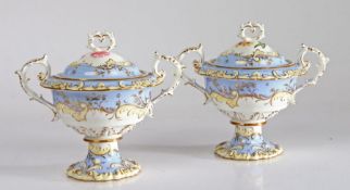 Pair of Chamberlains Worcester sauce tureens and covers, the scroll moulded pierced finials above