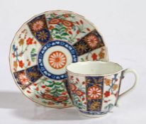 A Worcester Queens Pattern cup and saucer, circa 1770, with hatched square mark in blue to the