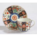 A Worcester Queens Pattern cup and saucer, circa 1770, with hatched square mark in blue to the
