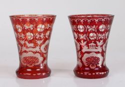 Pair of 19th Century Bohemian glass beakers, the flared red and clear glass tapering bowls with