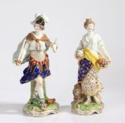 A pair of Derby porcelain figures, of a figure holding a sword and shield above a flaming torch