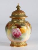 Royal Worcester vase and cover, the moulded domed lid with gadrooned finial, the pierced rim above a