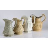 Four early to mid 19th Century relief moulded jugs, circa 1830-1850, the first depicting a smoking