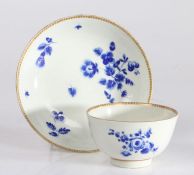 First Period Worcester tea bowl and saucer, circa 1770, the tea bowl and saucer with gilt roundel