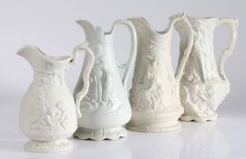 Four early to mid 19th Century relief moulded jugs, each depicting a Classical scene, 20cm high to