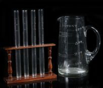 A rare four pint glass 'Patent Tell Tale Milk Jug' with etched markings, 25.5cm high; together