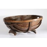 A Victorian Folk Art bentwood trug, of circular form with twin handles and footed supports, 49cm