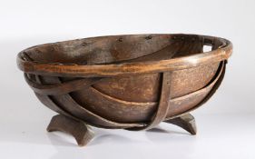 A Victorian Folk Art bentwood trug, of circular form with twin handles and footed supports, 49cm