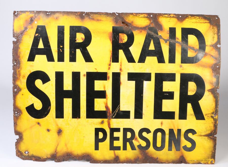 A WWII enamel air raid shelter sign, black on yellow background, 82cm x 111cm