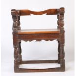An oak chair, 17th century & later, low-back, scroll arms, solid seat, turned supports and legs,