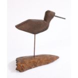 An early 20th century naive carved wooden decoy bird, carved from flat plank, elongated beak,
