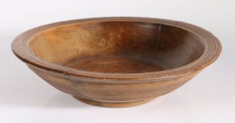 A George III Welsh turned sycamore cawl bowl, ring detail to everted rim and sides, circular flat