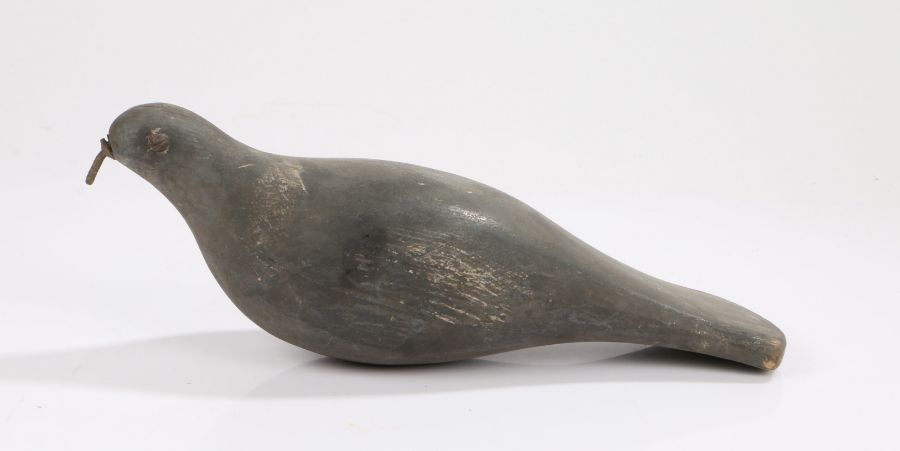 Early 20th Century decoy pigeon, painted in grey with a metal beak and screws set for eyes above a