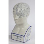 A good Chemist shop white porcelain phrenology head, by L N Fowler, of typical form in blue