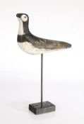 A 20th century French decoy shorebird, with pied paintwork, later wooden base, 22cm wide, 32cm total