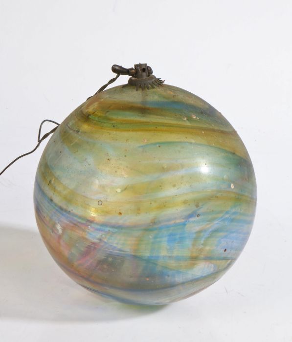 A 19th century multi-coloured glass witches ball, with inset hanger, approximately 14cm in diameter.