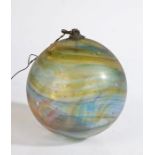 A 19th century multi-coloured glass witches ball, with inset hanger, approximately 14cm in diameter.