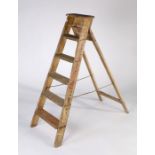 A set of painted pine decorator's folding ladders, six step, 132cm high.